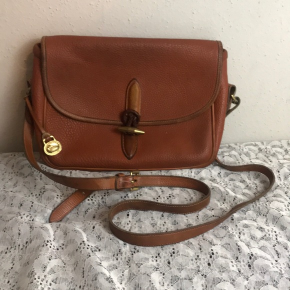 Dooney & Bourke Handbags - Vintage DOONEY & BOURKE Brown Leather Purse!
